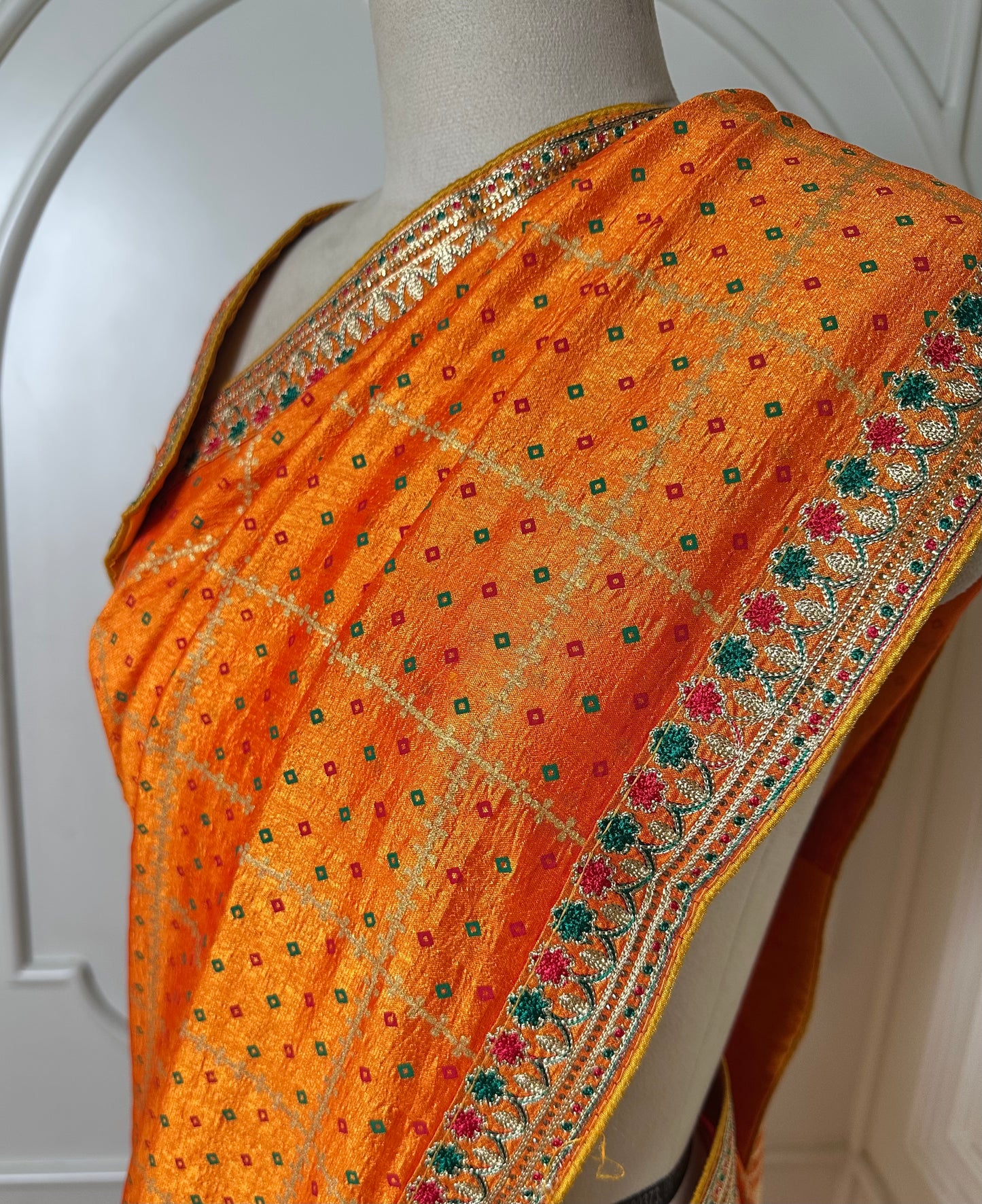 Vibrant Orange Designer Saree with Gold Buti Checks & Multicolor Embroidered Border
