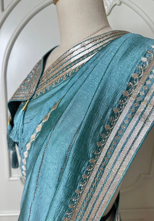 Aqua Blue Designer Saree with Zari Woven Border & Tassels