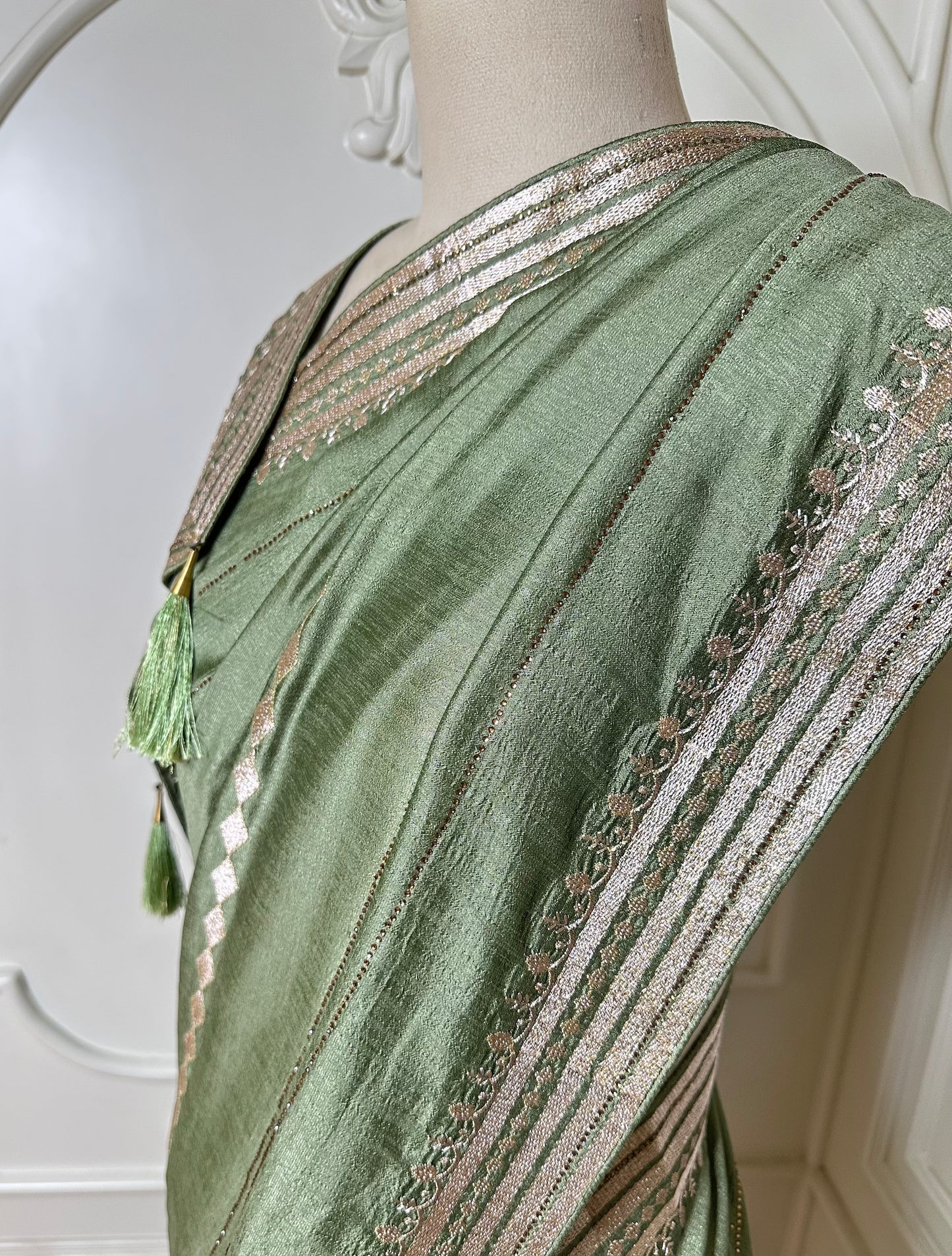 Pastel Mint Green Designer Saree with Zari Embroidered Border & Tassels