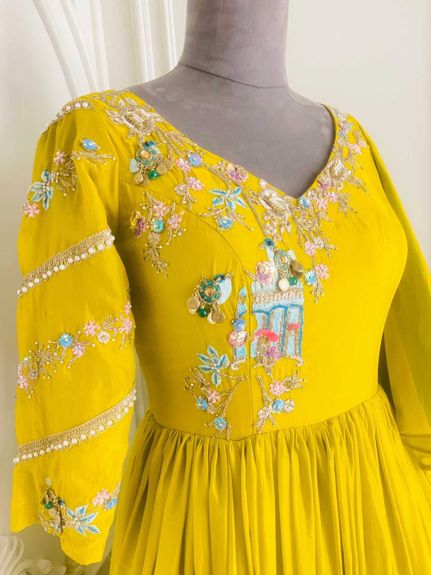 Charming gown with attached duptta in sun shine yellow color