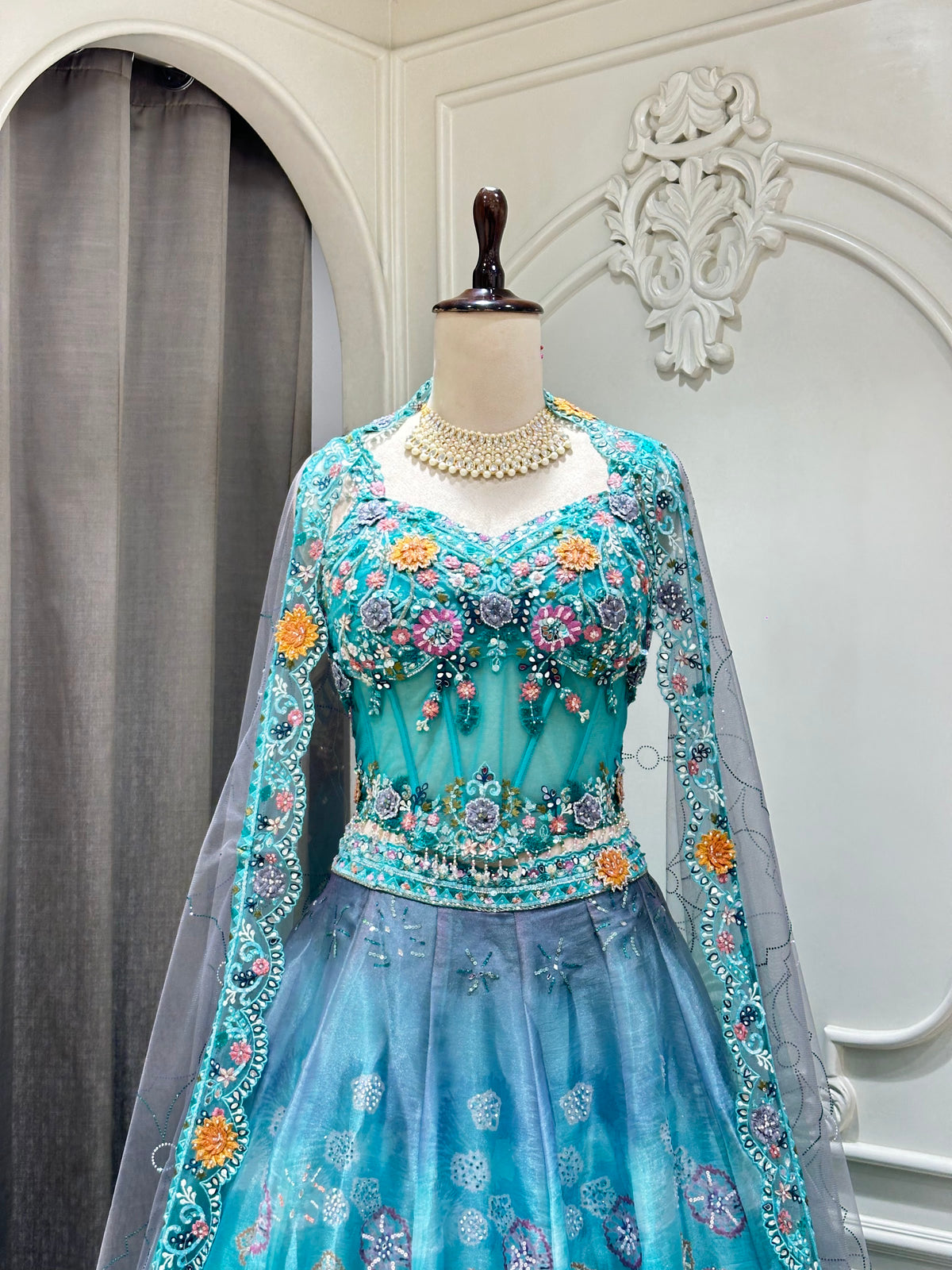 Sky blue lehenga set by Mamta Saree - bodice floral detail close-up