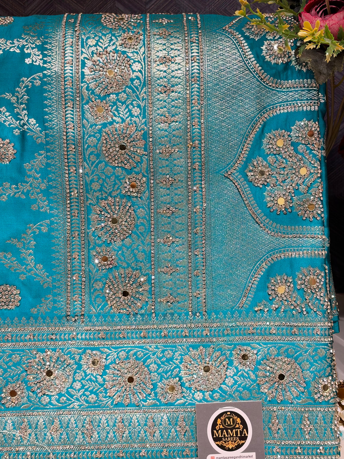 teal saree by Mamta Saree - floral motif and border view
