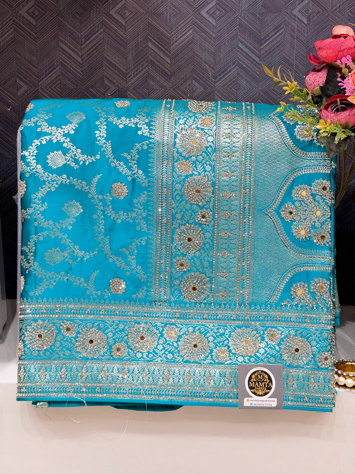 teal saree by Mamta Saree - mirror work border detail