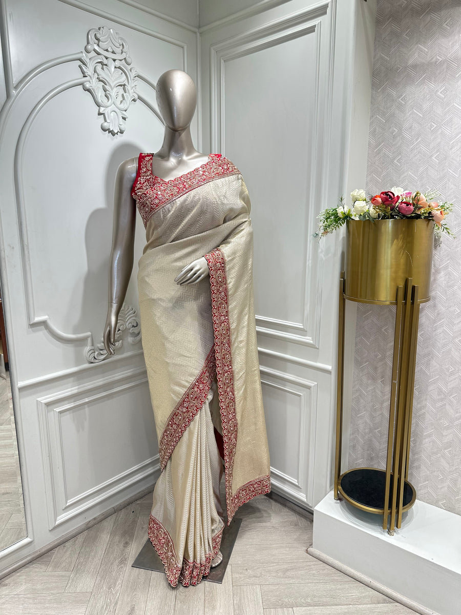 Ivory saree by Mamta Saree - full drape with red beaded border