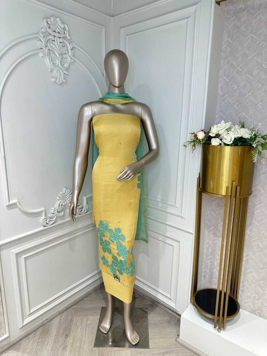 Yellow floral embroidered suit set by Mamta Saree - bodice detail