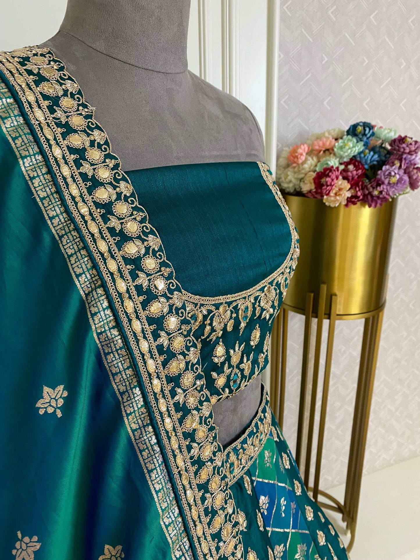 Deep green Banarasi lehenga