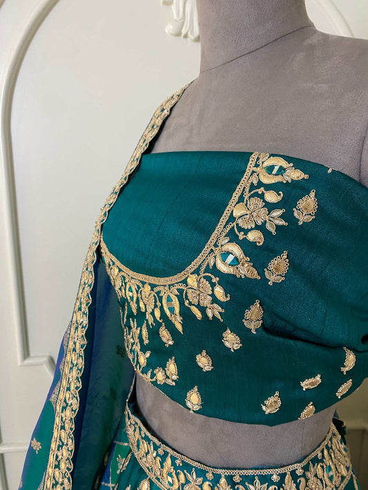 Deep green Banarasi lehenga