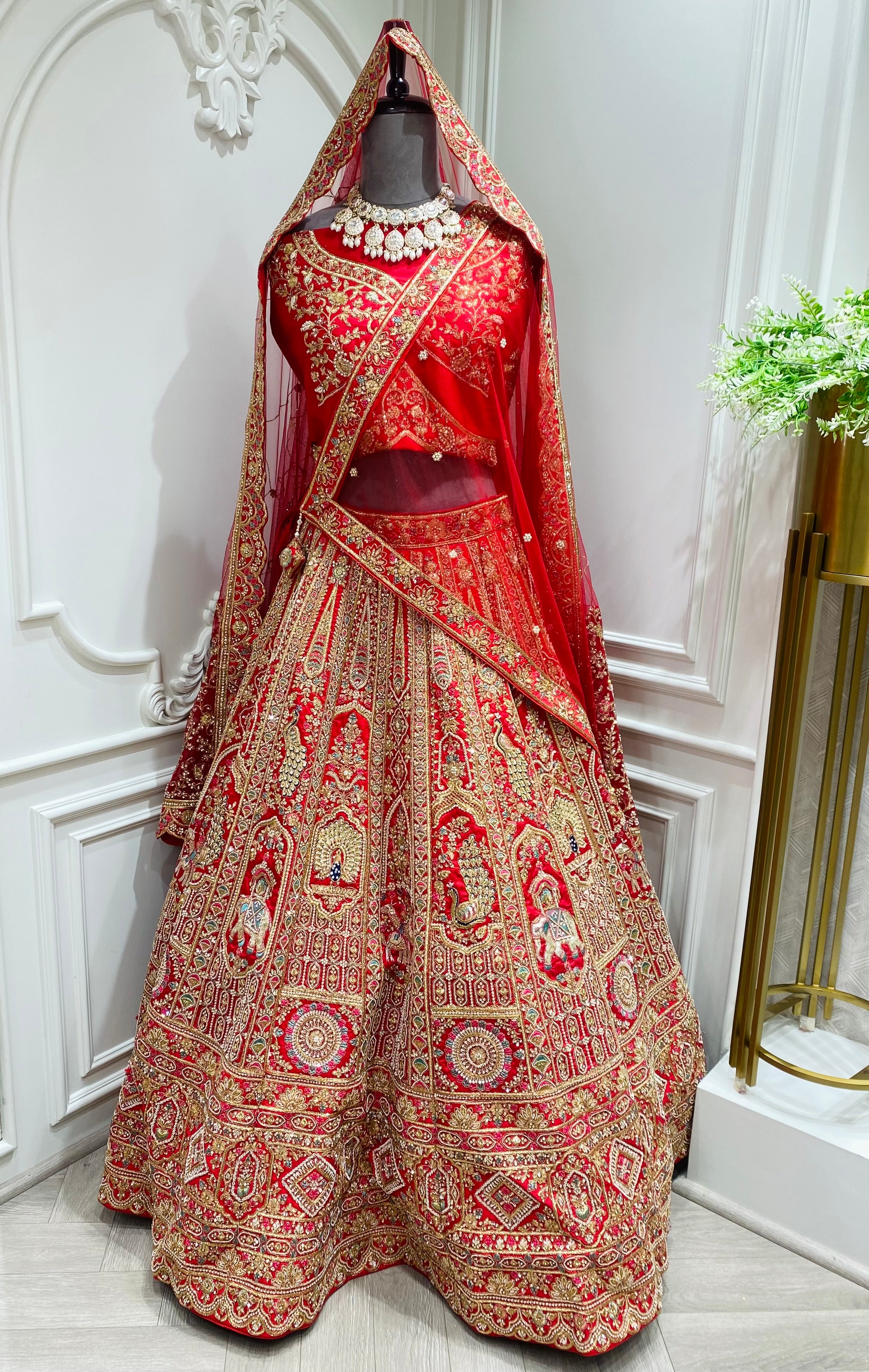 Red zari work bridal lehenga