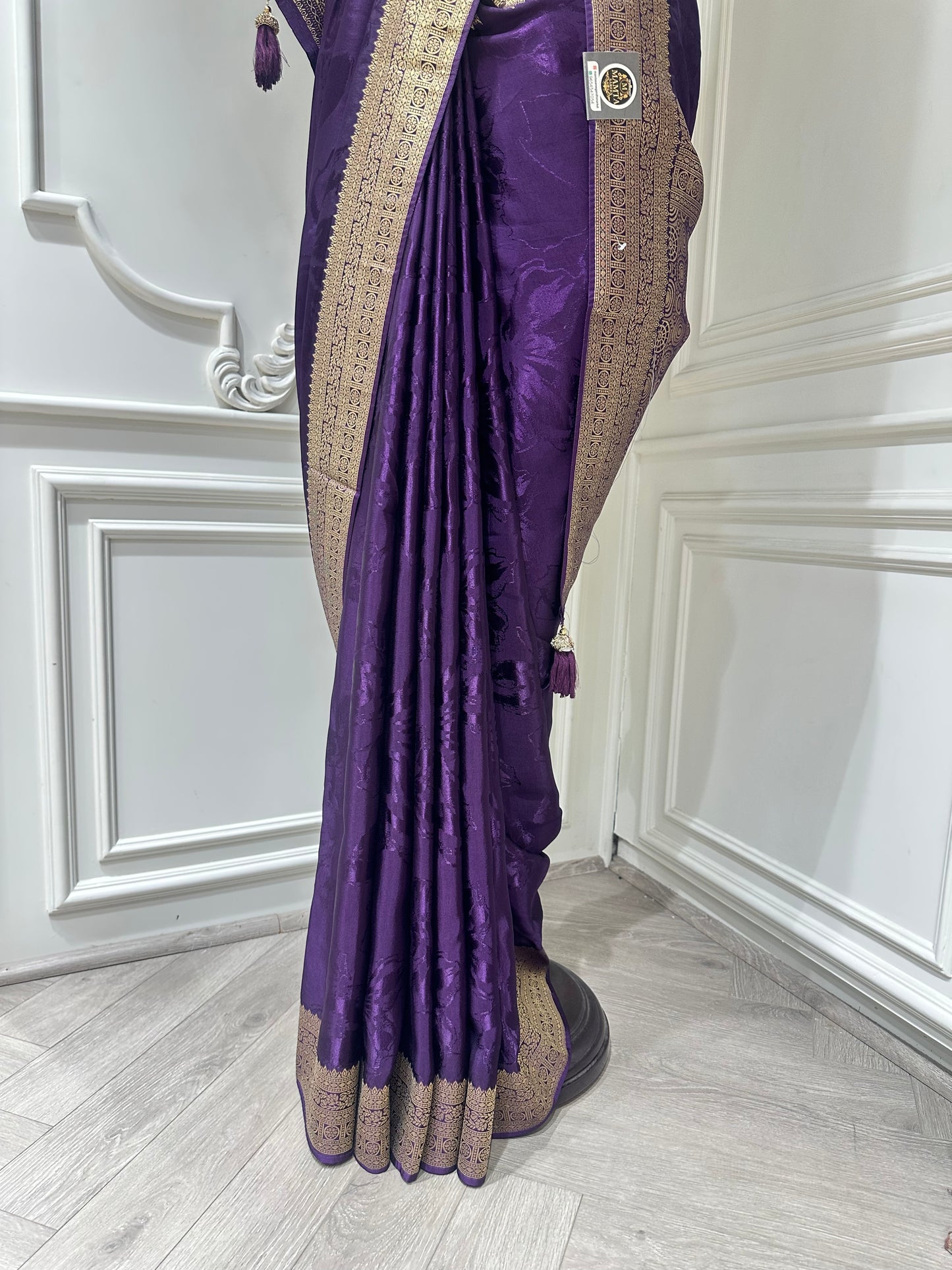 Royal Banarasi Silk Saree with Rich Gold Zari Border & Tassels