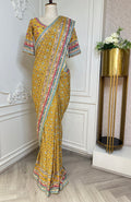 Mustard Yellow Floral Designer Saree with Mirror Work & Embroidered Border