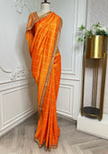 Vibrant Orange Designer Saree with Gold Buti Checks & Multicolor Embroidered Border