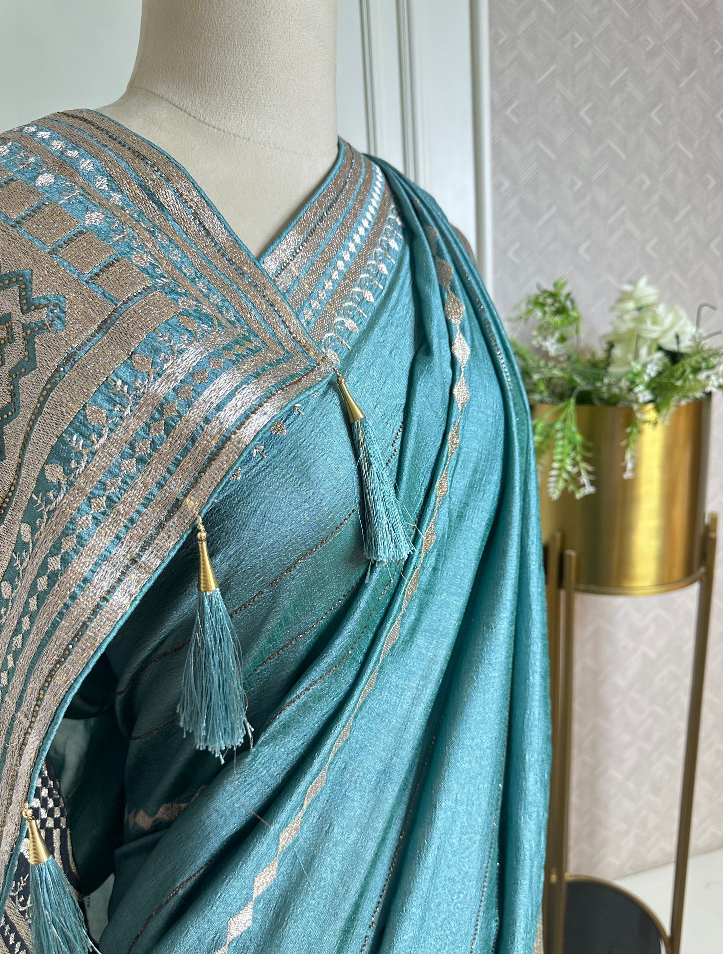 Aqua Blue Designer Saree with Zari Woven Border & Tassels