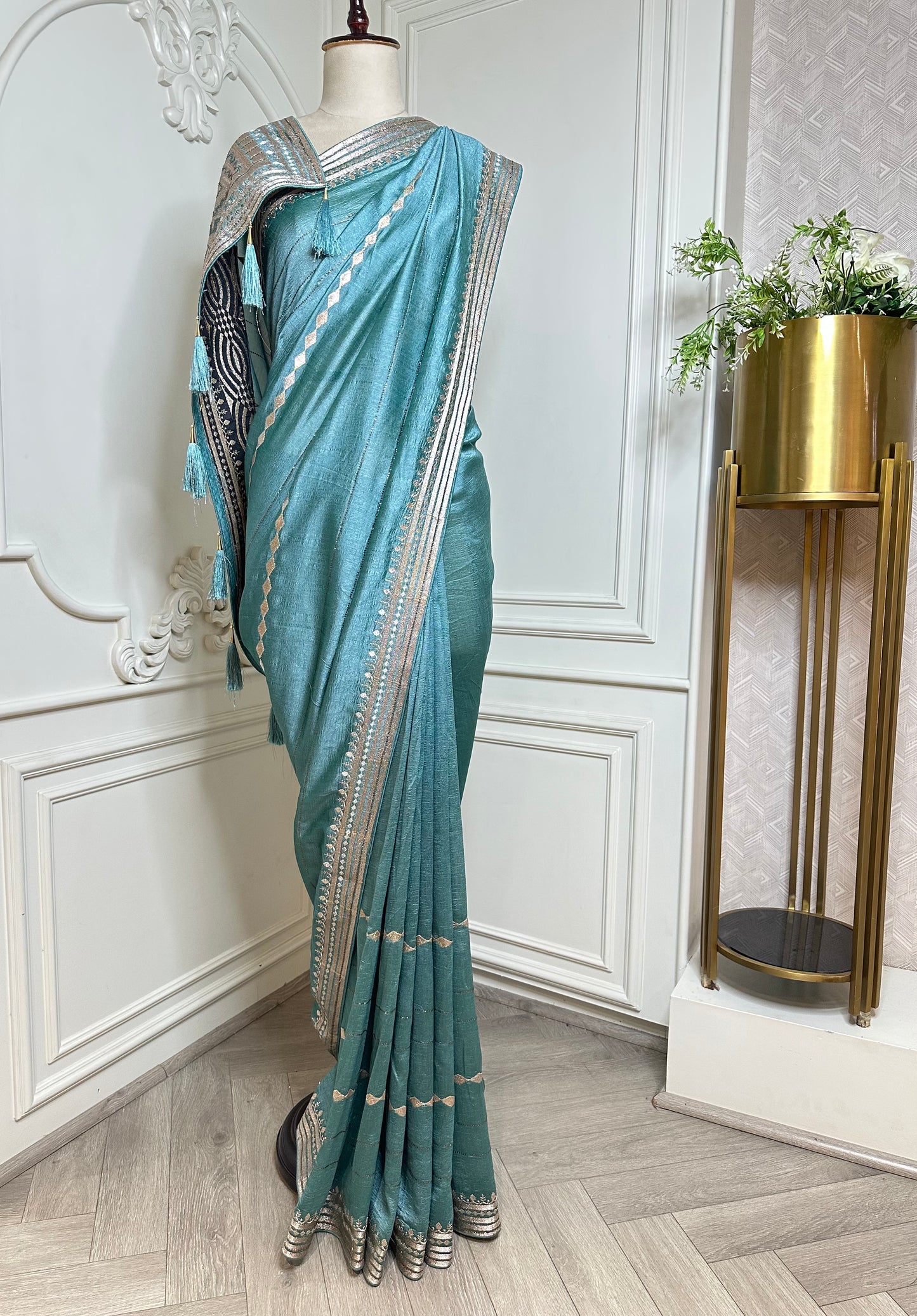 Aqua Blue Designer Saree with Zari Woven Border & Tassels