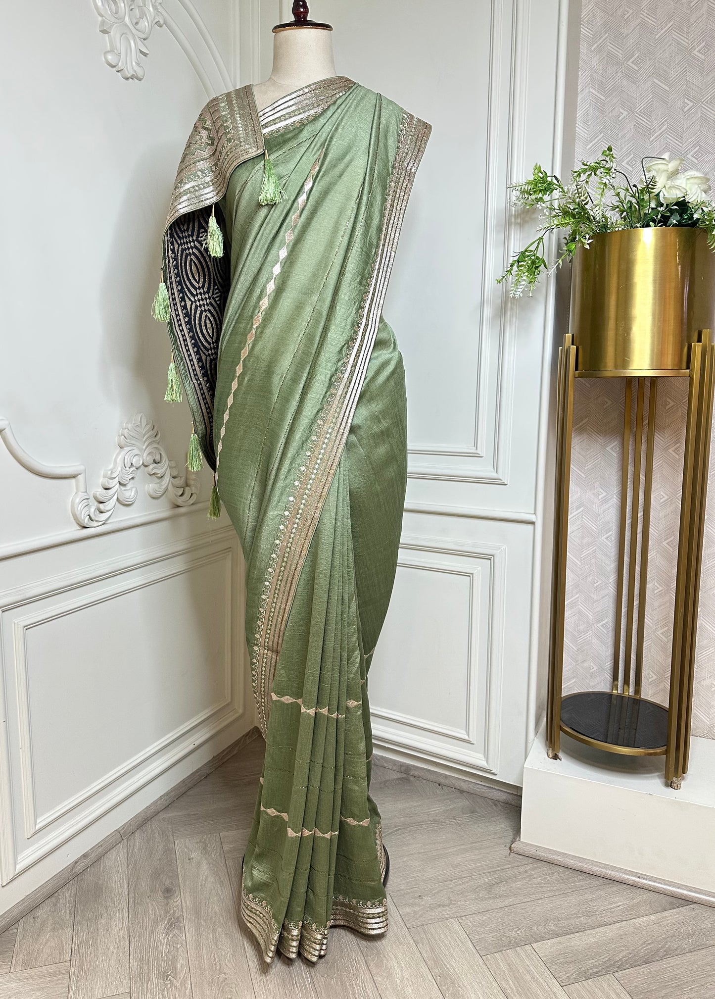 Pastel Mint Green Designer Saree with Zari Embroidered Border & Tassels