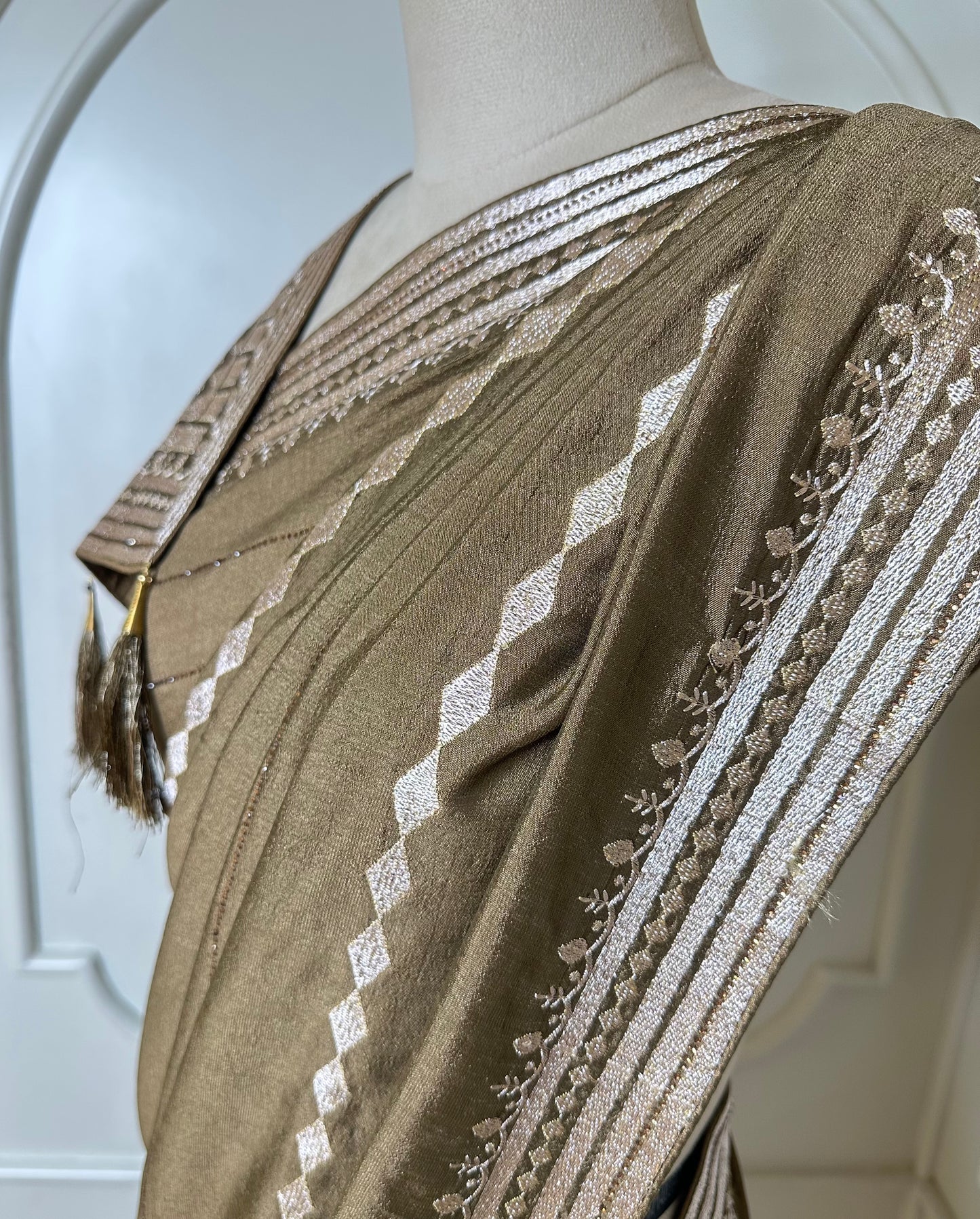 Olive Brown Designer Saree with Zari Embroidered Border & Tassels