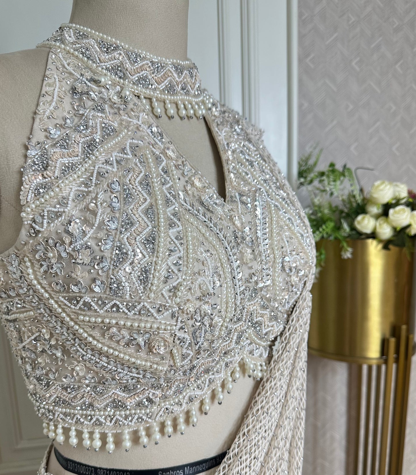 Ivory Designer Net Saree with Hand Embellished Blouse