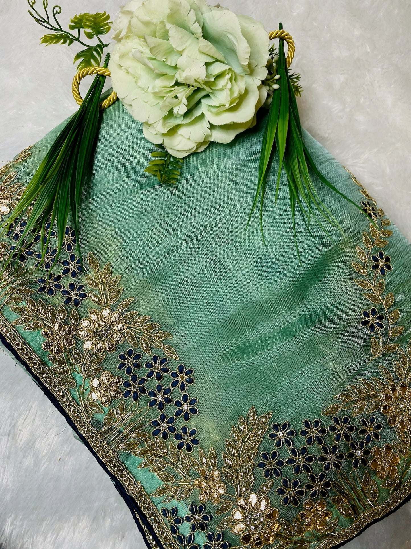 lilac organza saree with goat Zari work