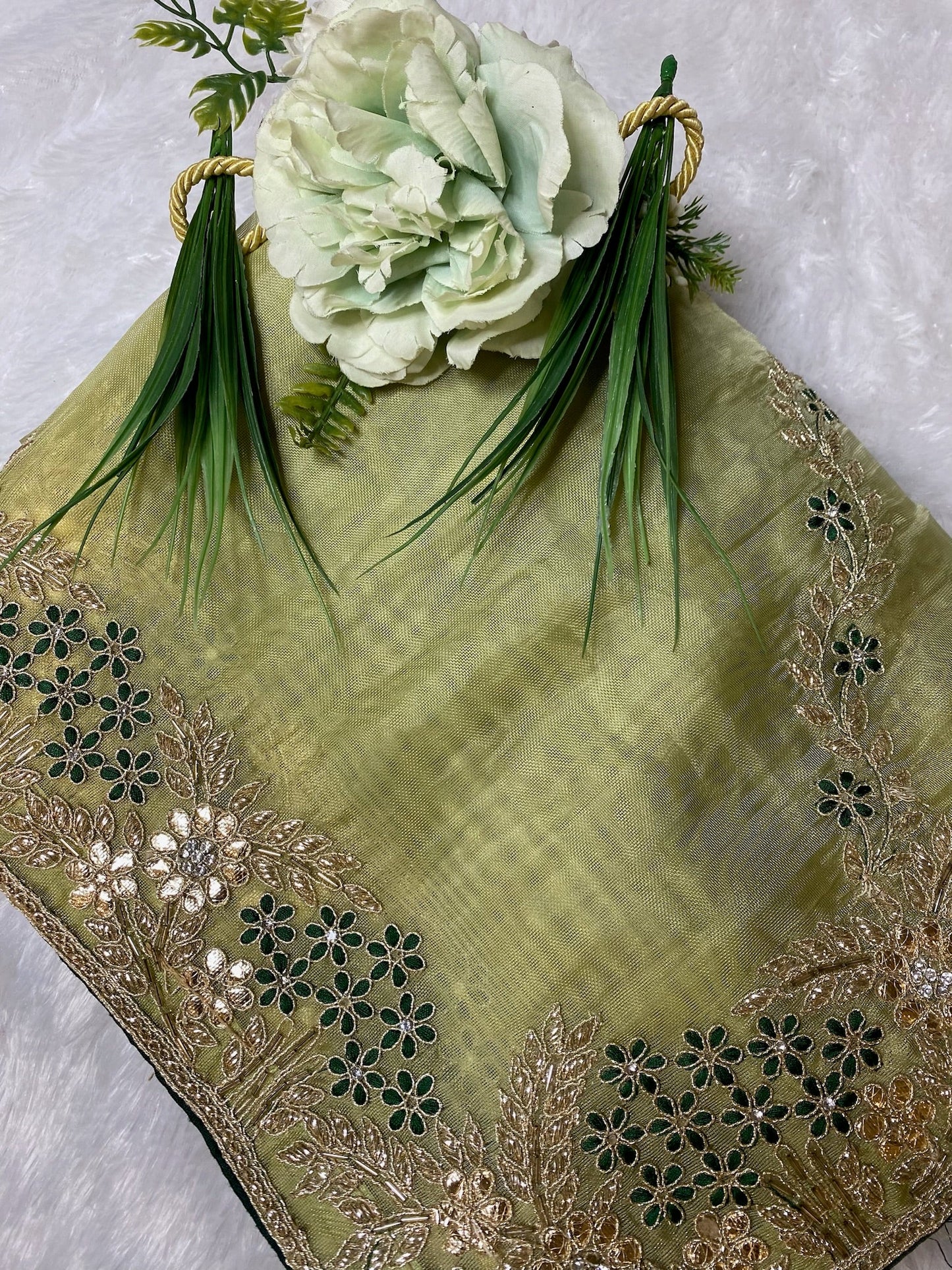 lilac organza saree with goat Zari work